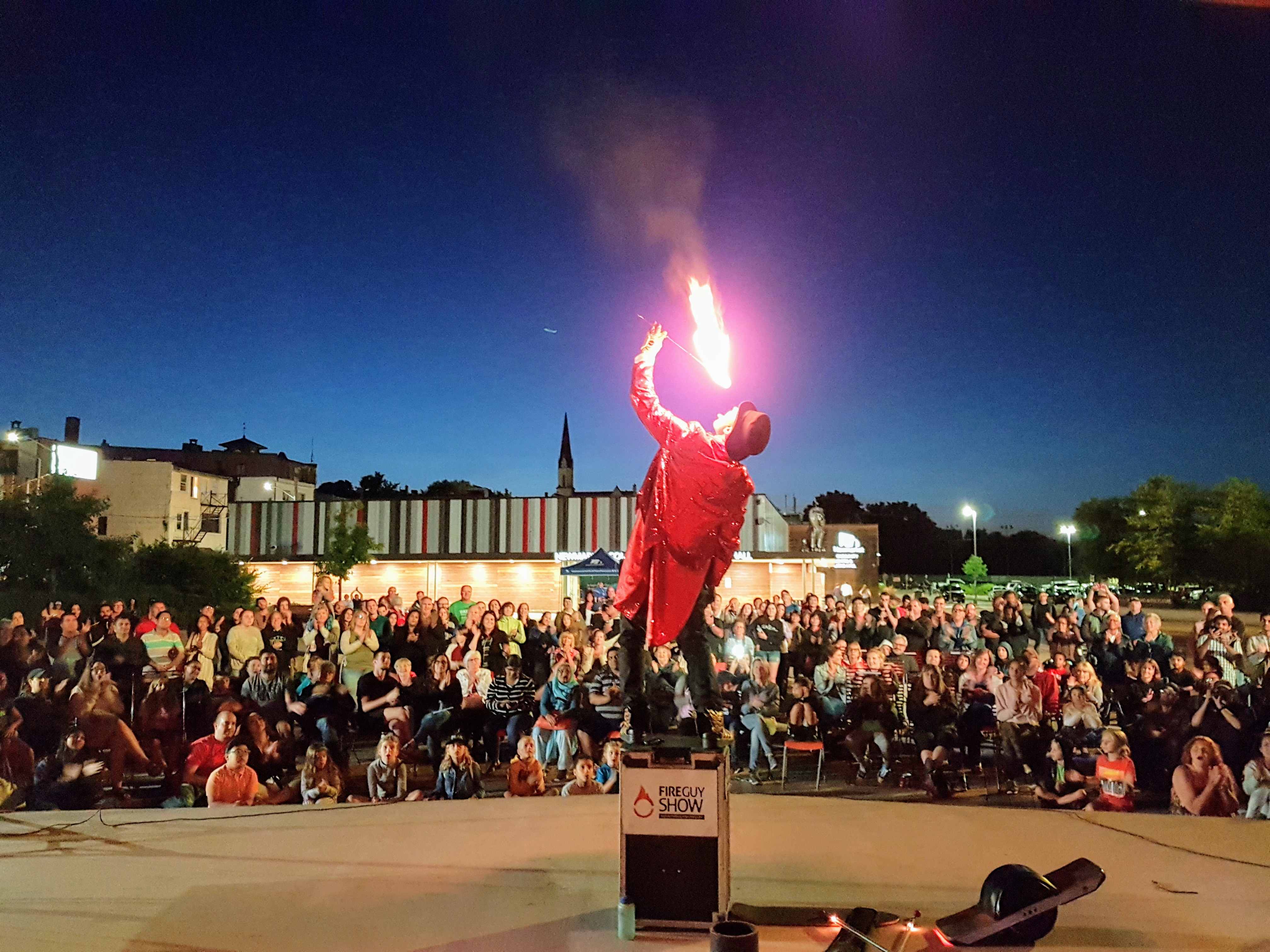 image of rockabilly joe breathing fire on stage